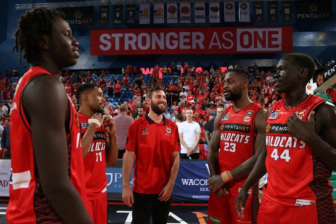 Dech (right) with the Wildcats in 2019.