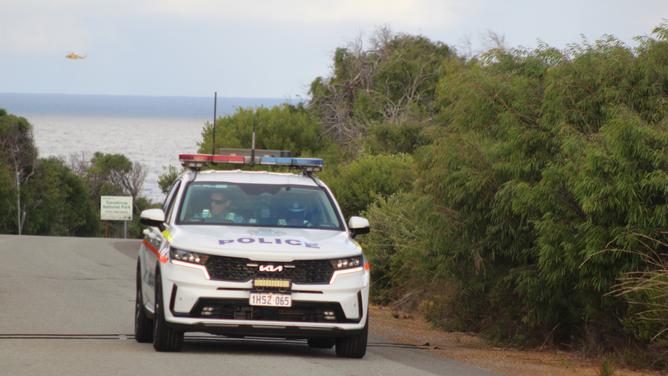 Police leaving the scene on Friday.