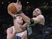 Boston forward Jayson Tatum (0) scored 35 points as the Celtics closed out the series with Orlando. (AP PHOTO)