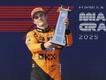 Drivers' championship leader Oscar Piastri raises the trophy after his dominant win in the Miami.