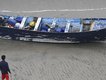 Four people were rescued after the "panga"-style open fishing vessel washed ashore near San Diego. (AP PHOTO)