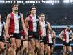 St Kilda players leave the MCG field disconsolately after the defeat by Carlton. (Joel Carrett/AAP PHOTOS)