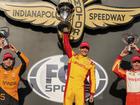 Australia's Will Power (r) shares the IndyCar podium with winner Alex Palou and Pato O'Ward. (AP PHOTO)